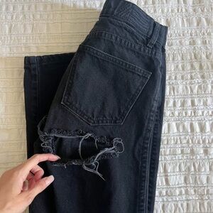 Revice High Rise Black Jeans with rip on backside